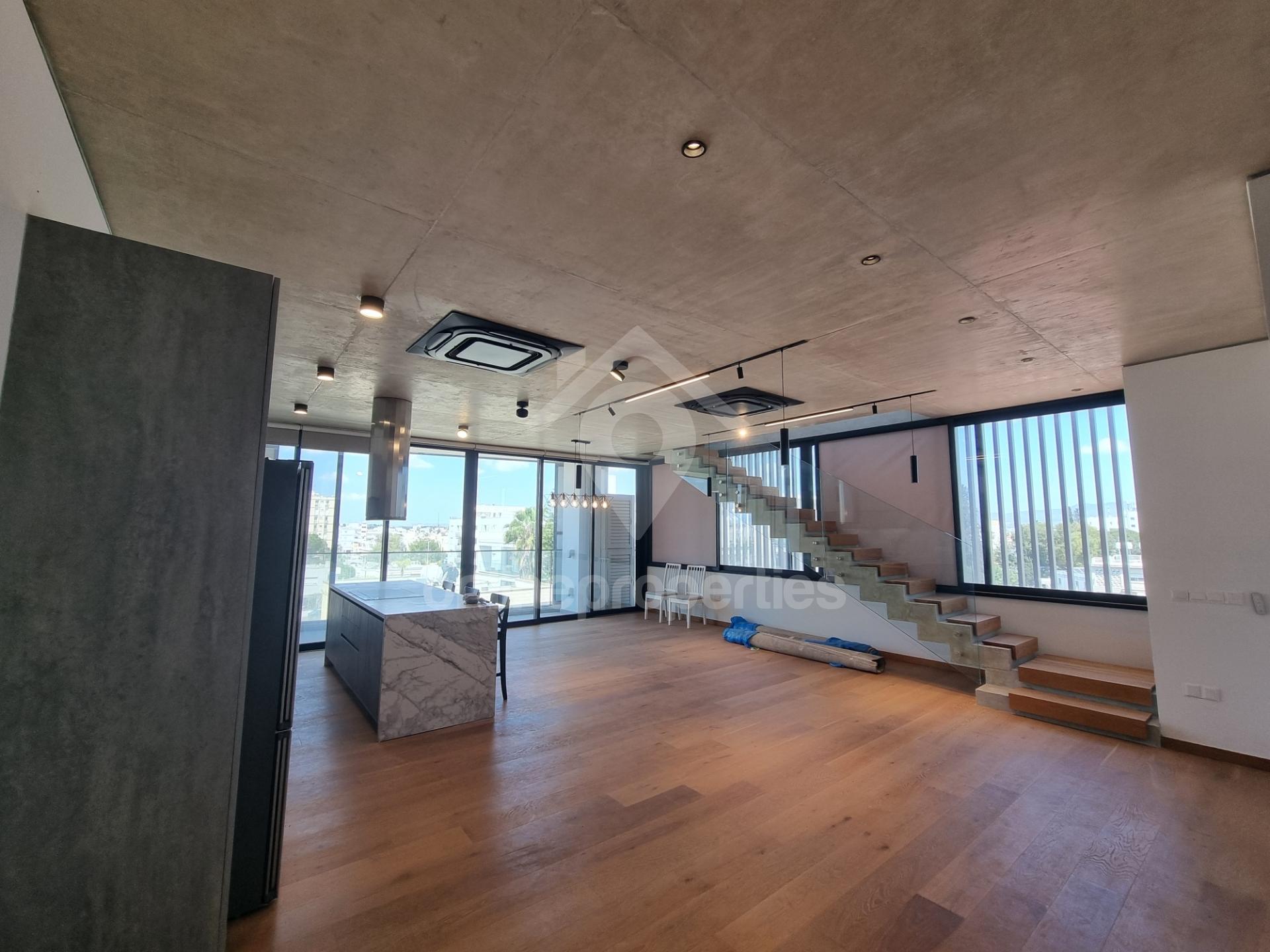 Exclusive Top-Floor Apartment in Prime Location