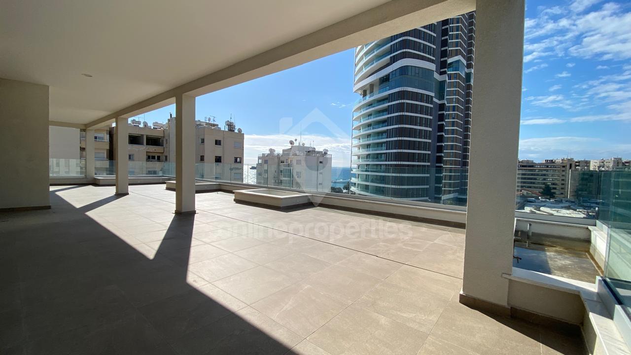 A penthouse steps from the sea
